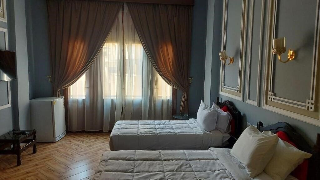 Изображение Cosmopolitan Plaza Inn 4*