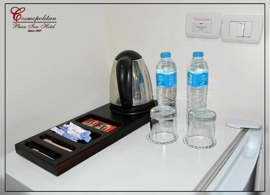 Отель Cosmopolitan Plaza Inn 4*