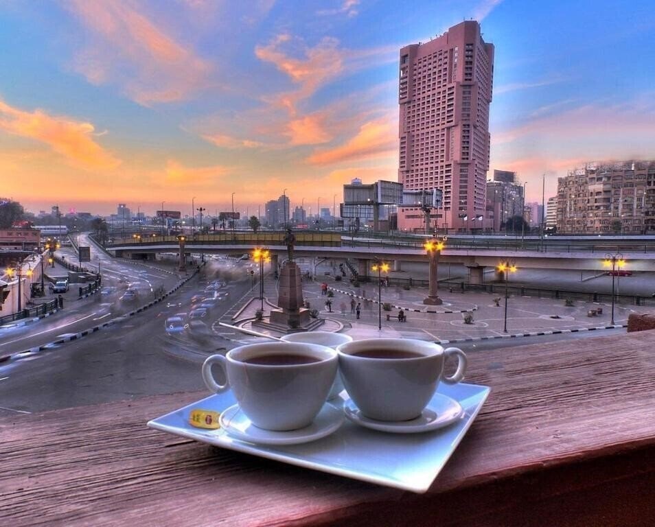 Фотографія Tahrir Plaza Suites 3*
