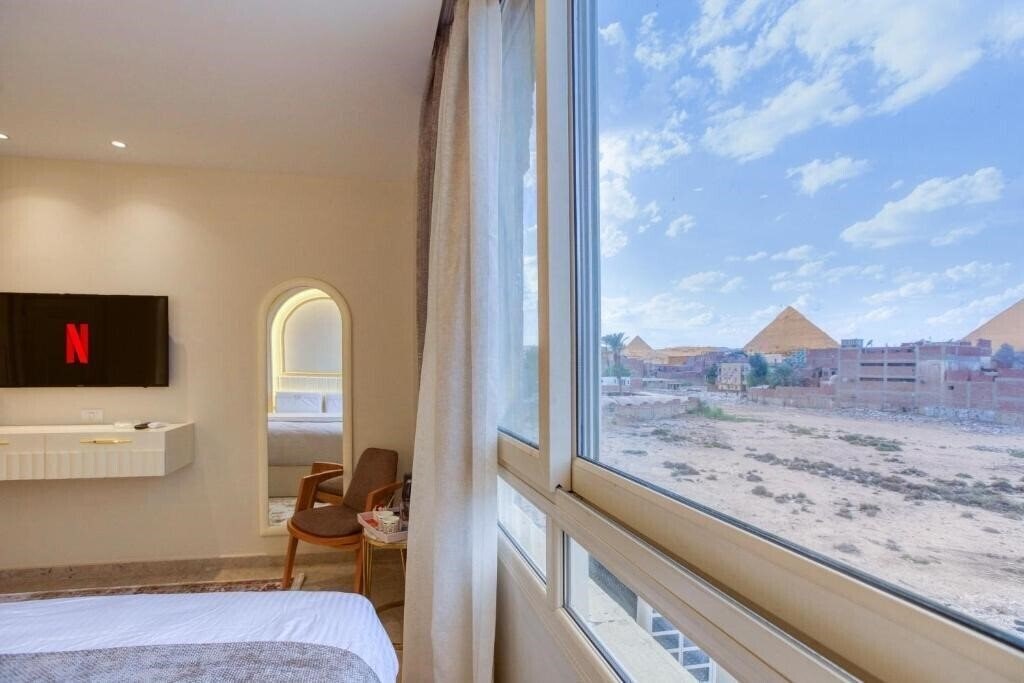 Фото Pyramids Plateau Hotel 3*