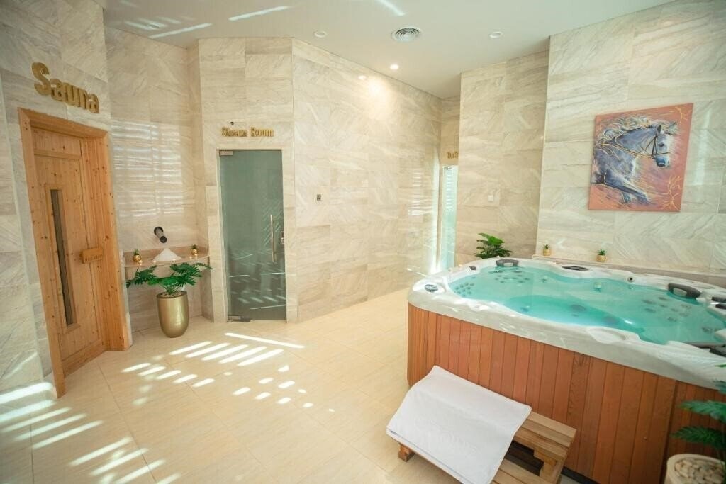 Фото Tolip Hotel Olympic International City 5*