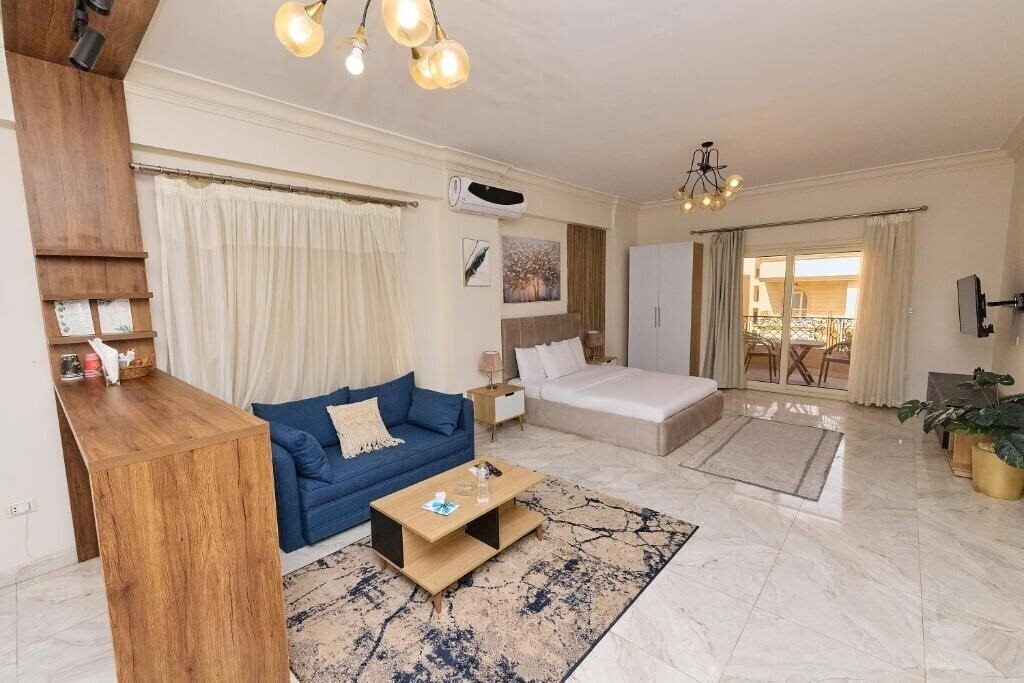 Фото Settle Inn South 90 Apartments 3*