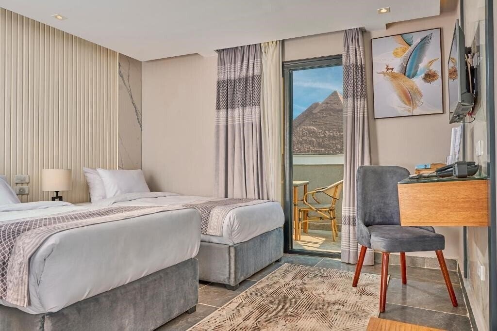 Фото Khan Duidar Inn Pyramids View Rooftop 4*