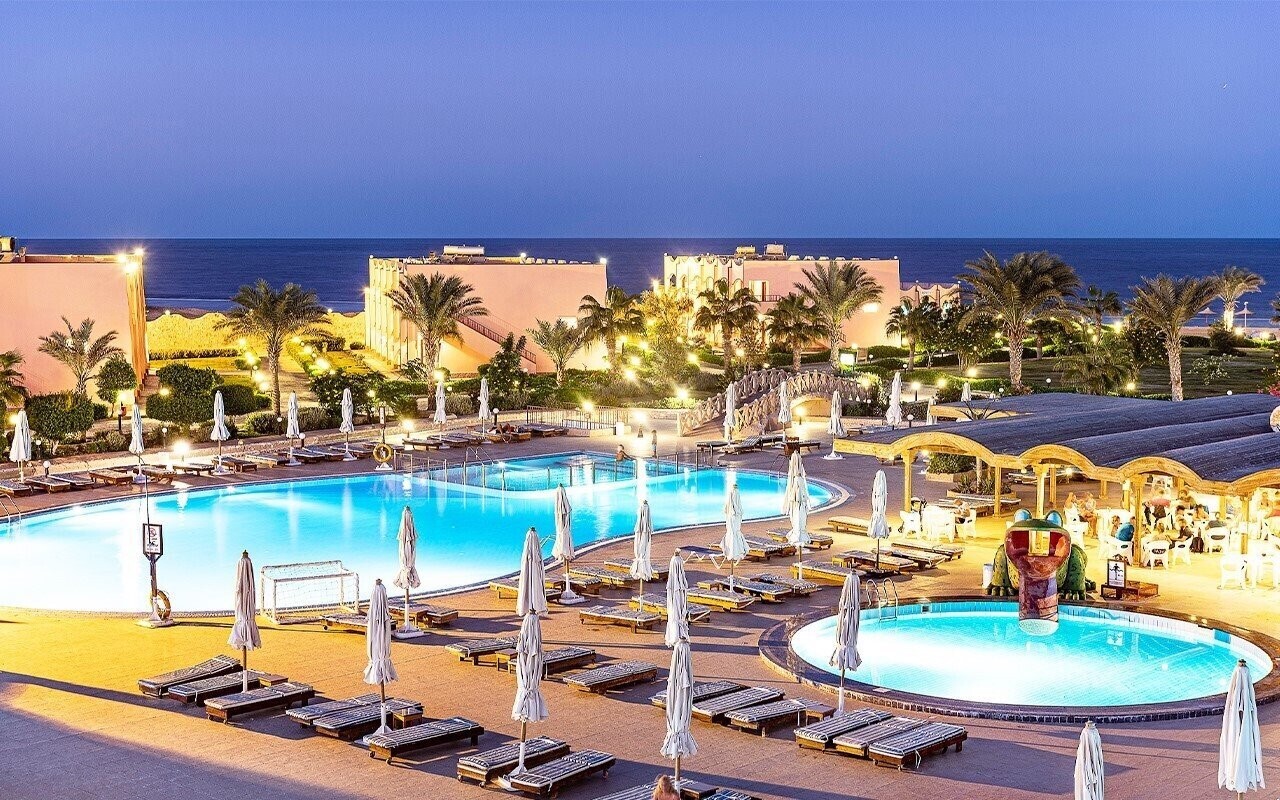 Отель The Three Corners Happy Life Beach Resort 4*