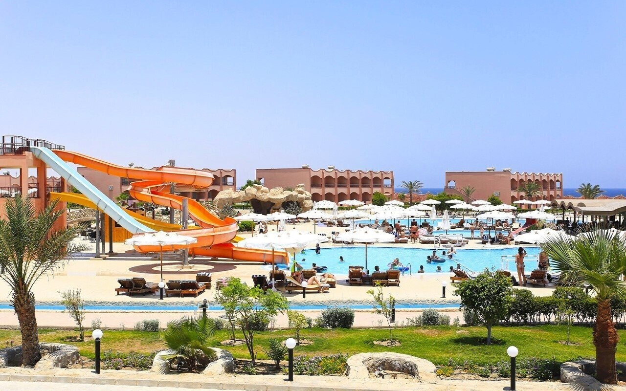 Фото The Three Corners Happy Life Beach Resort 4*