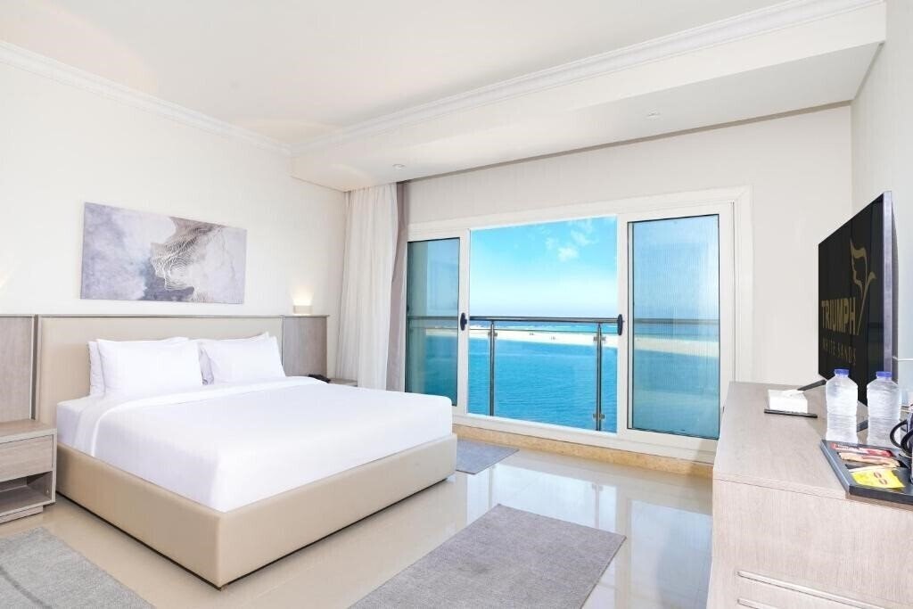 Отель Triumph White Sands 4*