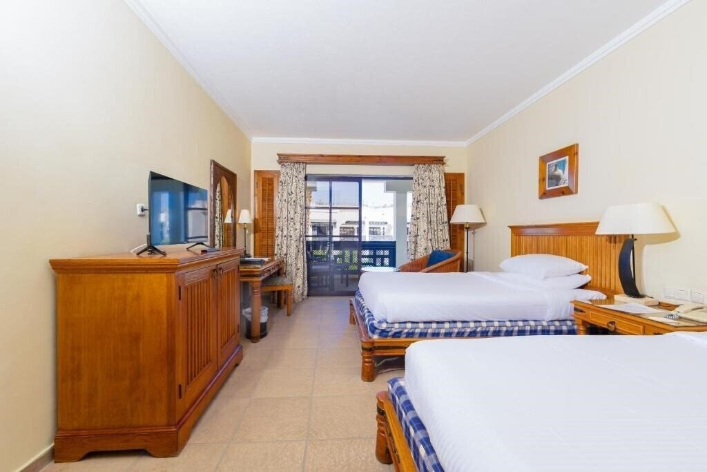 Фото Sharm Resort Hotel (ex. Sharm Plaza, Crowne Plaza Resort) 5*