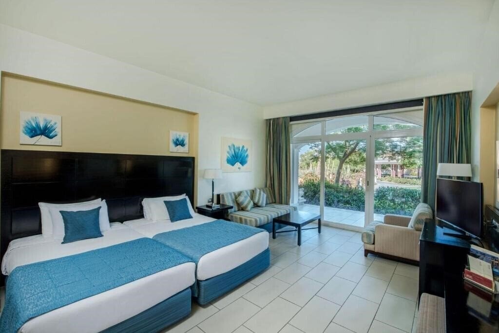 Фотографія Reef Oasis Blue Bay Resort 5*