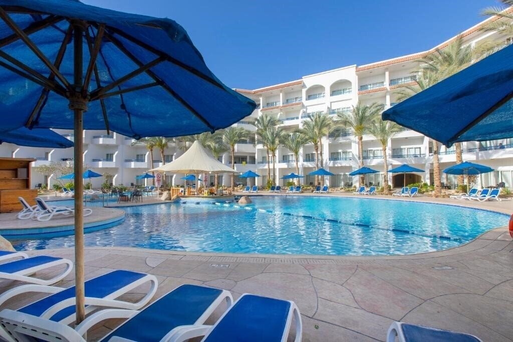 Отель Naama Bay Hotel & Resort 5*