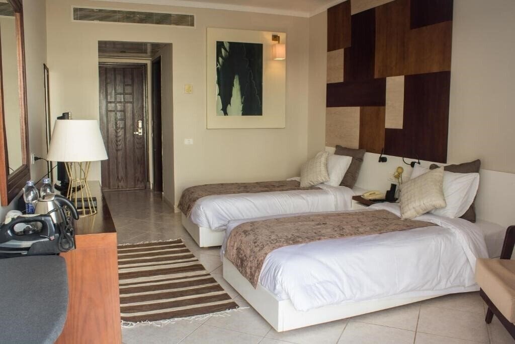 Фотография Swiss Heaven Sharming Inn Hotel (ex. Sharming Inn Hotel, Sol Y Mar Sharming Inn) 4*