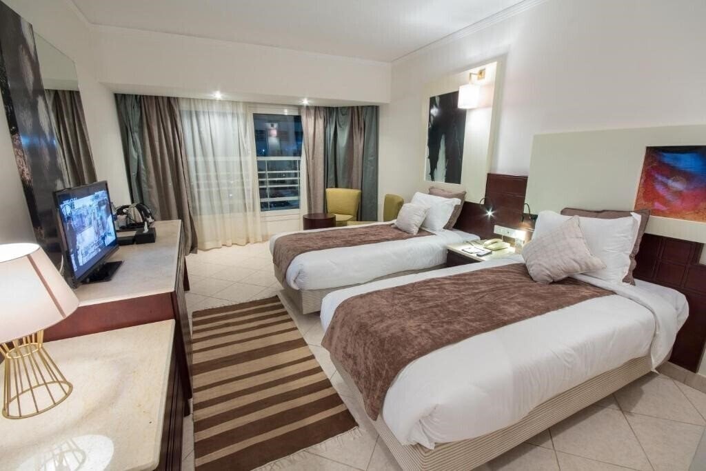 Изображение Swiss Heaven Sharming Inn Hotel (ex. Sharming Inn Hotel, Sol Y Mar Sharming Inn) 4*