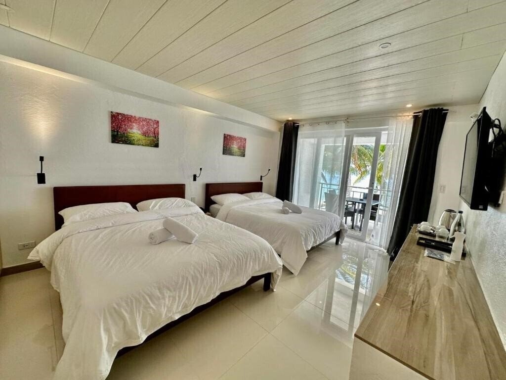 Картинка Calypso Beach & Dive Resort 3*