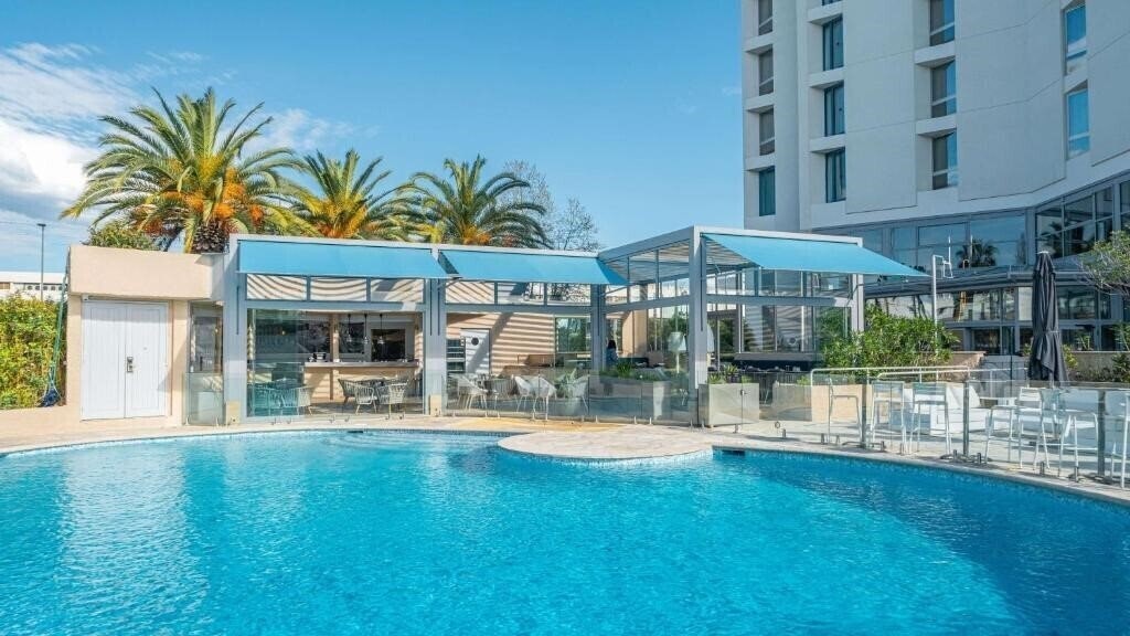 Отель Radisson Hotel Nice Airport 4*