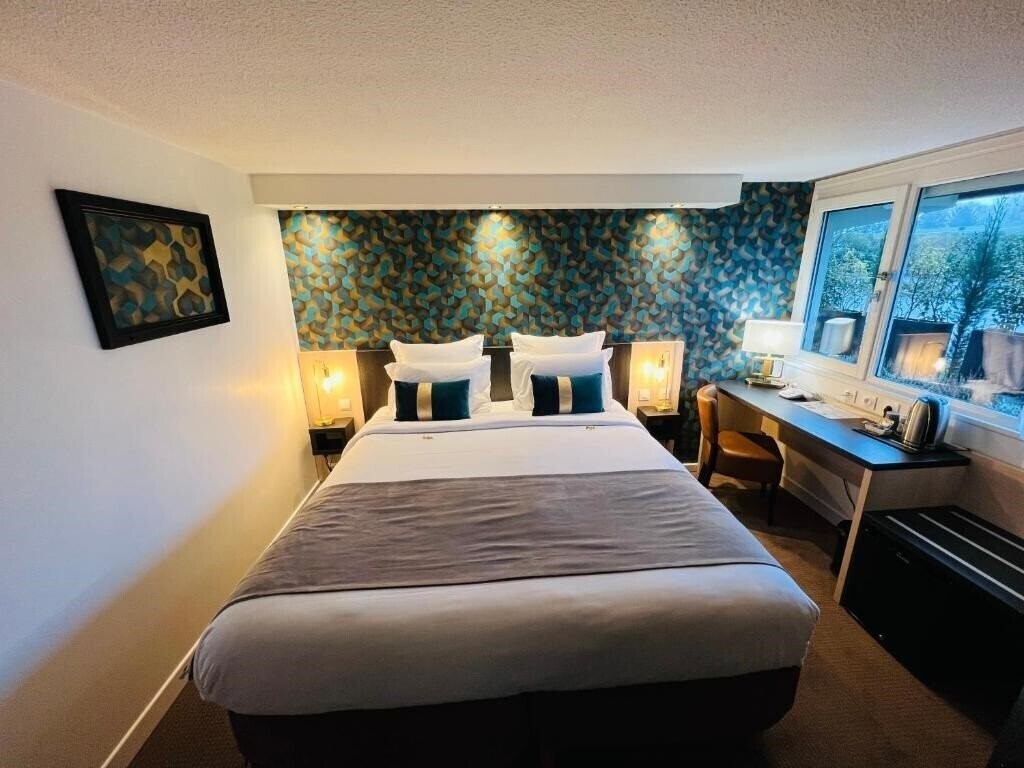 Фото Kyriad Lisieux 4*