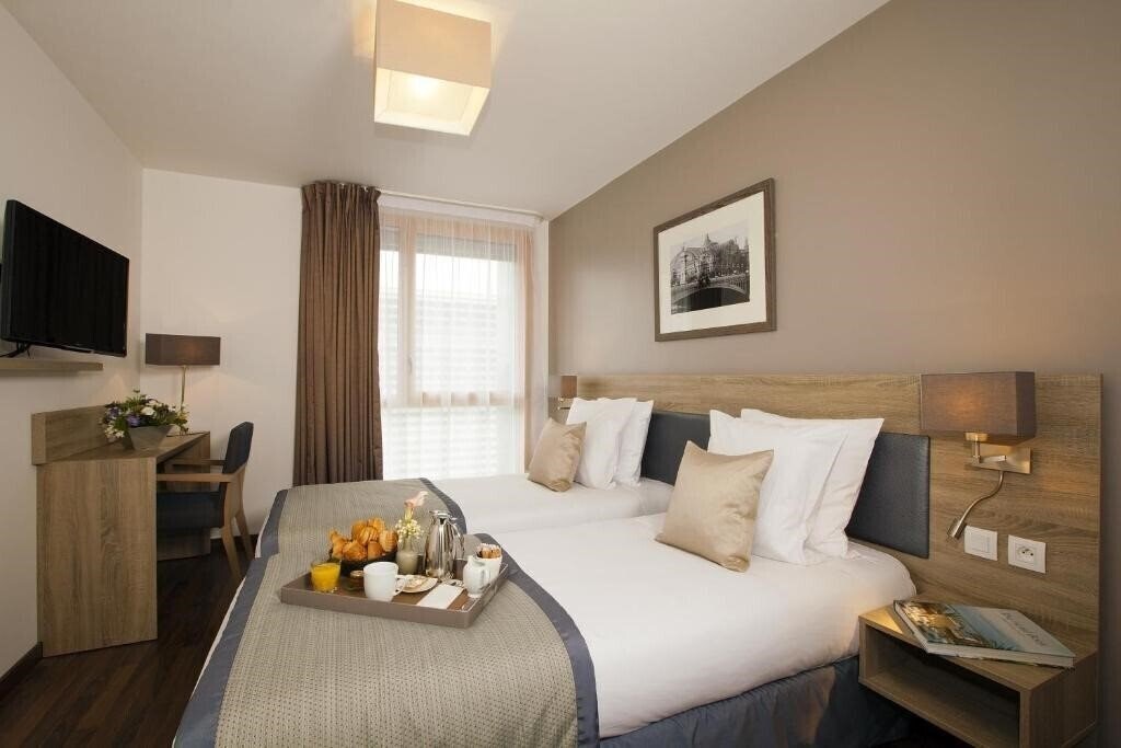 Фото Residhome Paris Issy Les Moulineaux 4*