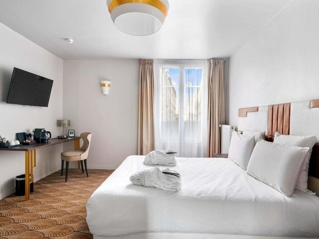 Фото Mercure Opera Faubourg 4*