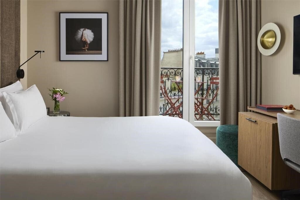 Фото NH Paris Opera Faubourg 4*
