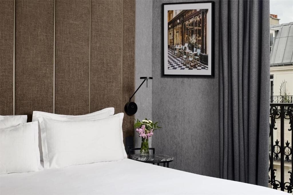 Фотографія NH Paris Opera Faubourg 4*