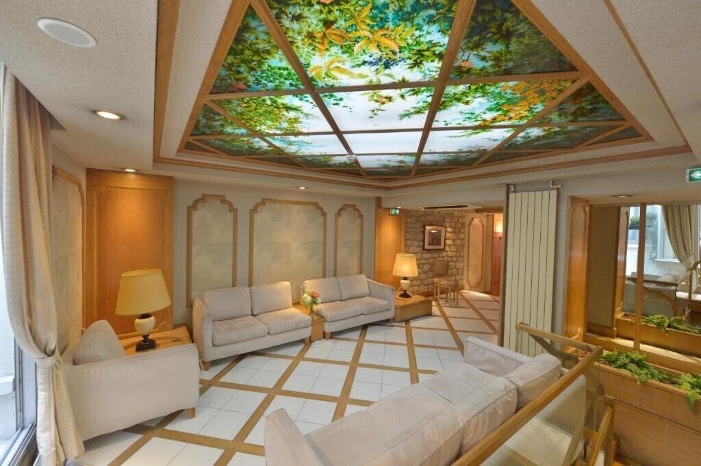 Отель Hotel Renoir Paris Montparnasse 3*
