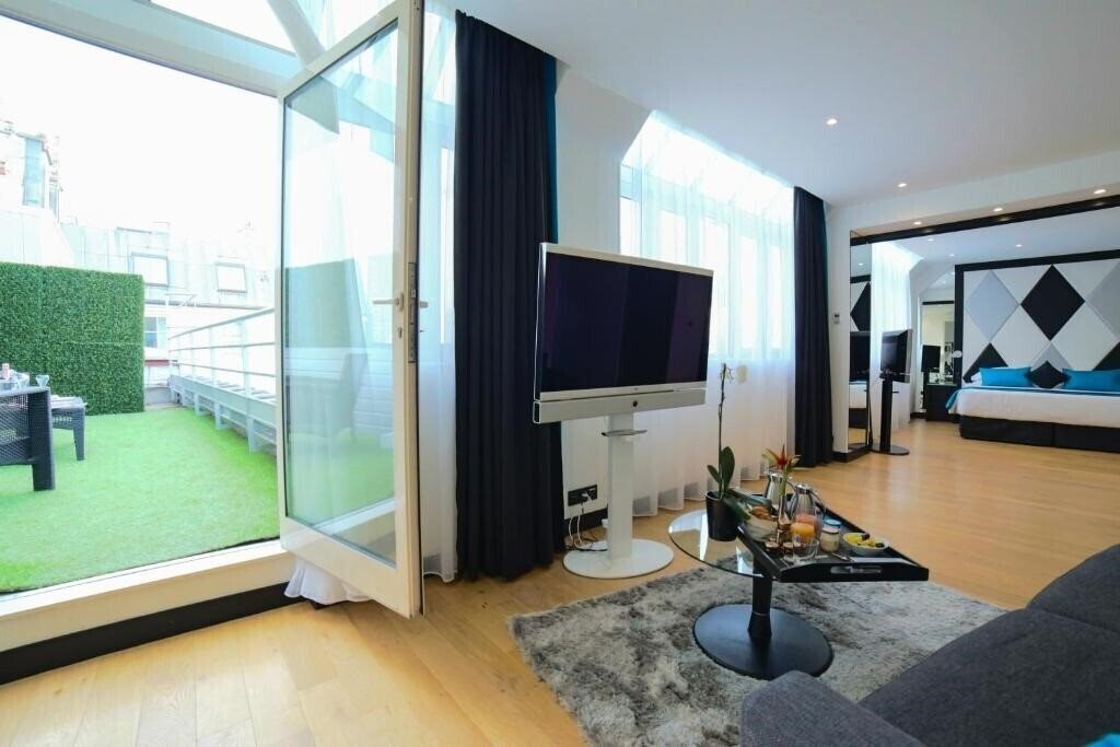 Фотография L'Empire Paris 4*
