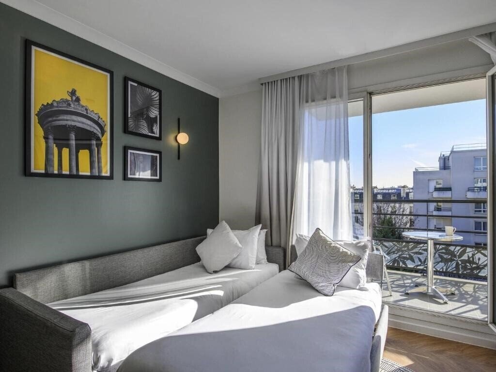 Фото Adagio Aparthotel Paris Buttes Chaumont Aparthotel 4*