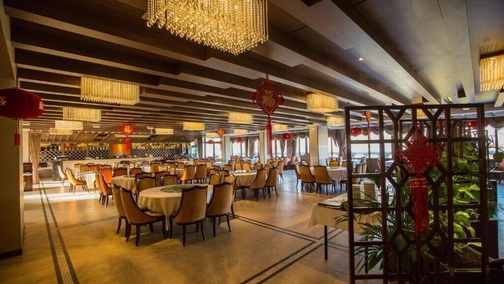Фотографія Huatian Chinagora Hotel 4*