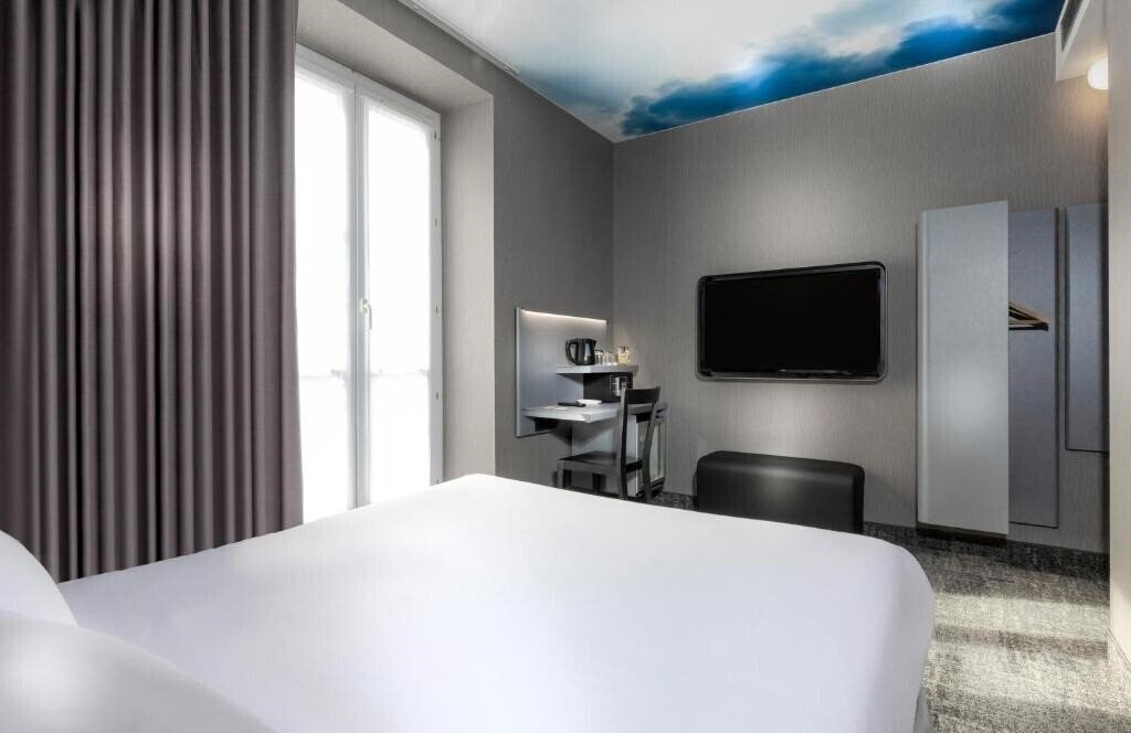 Отель Libertel Montmartre Opera 3*
