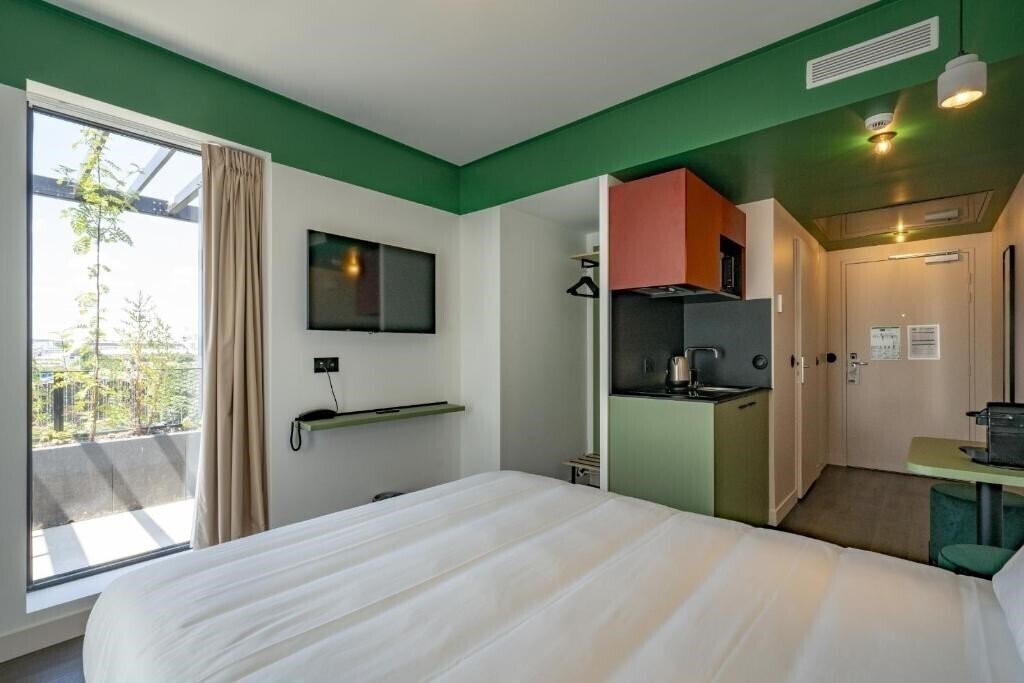 Изображение All Suites Appart Hotel et Hotel Paris 13 Porte d'Italie 3*