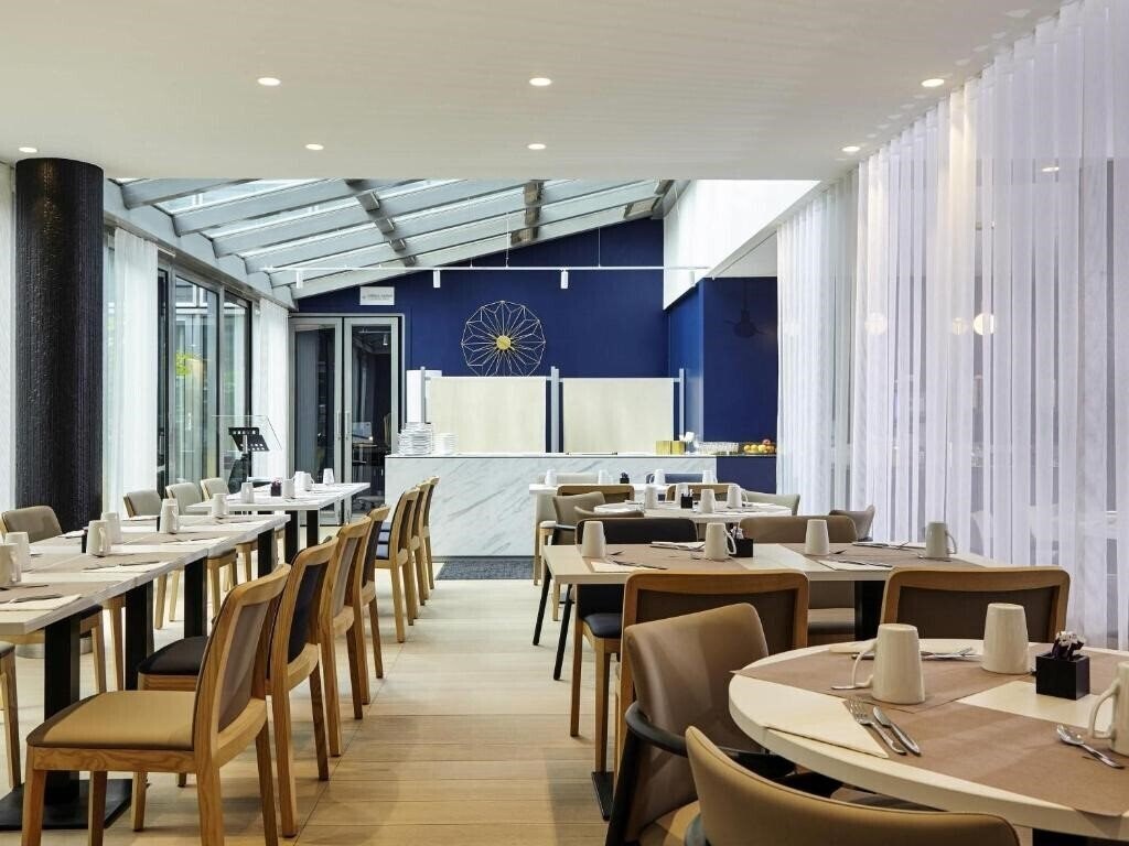 Отель Mercure Paris La Defense Grande Arche 4*