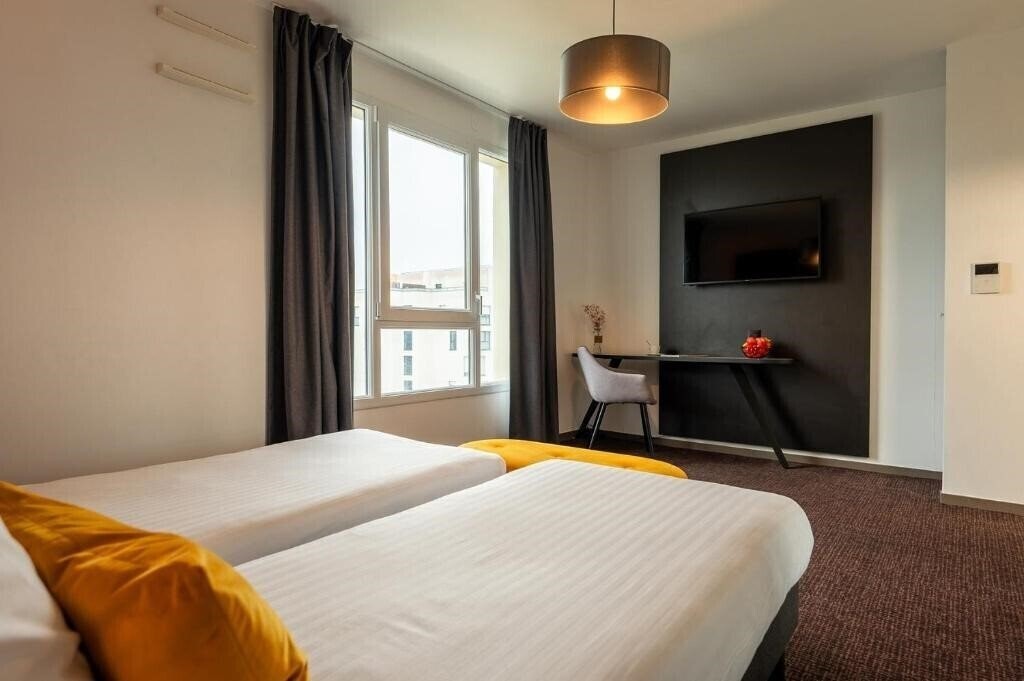 Фото Nemea Appart Hotel Europe Velizy Villacoublay (ex. Nemea Appart'Hotel Velizy) 4*