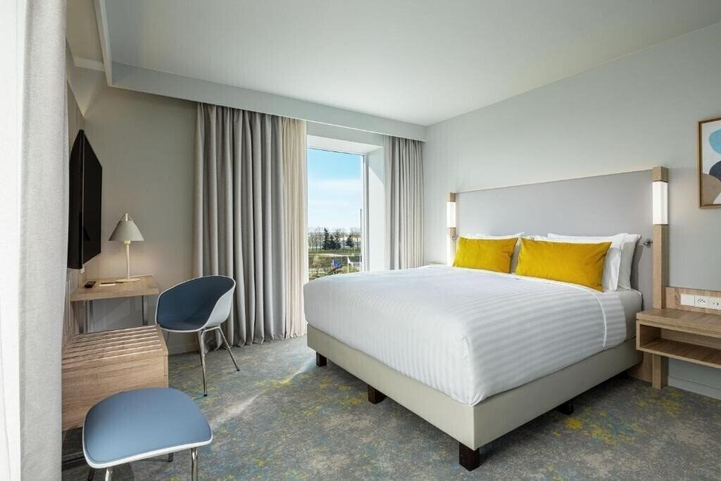 Фото Courtyard by Paris Charles de Gaulle Airport 4*