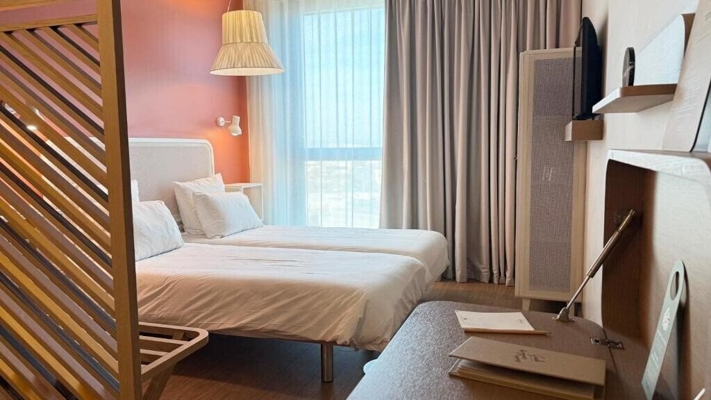 Фотография Okko Hotels Paris La Defense 4*