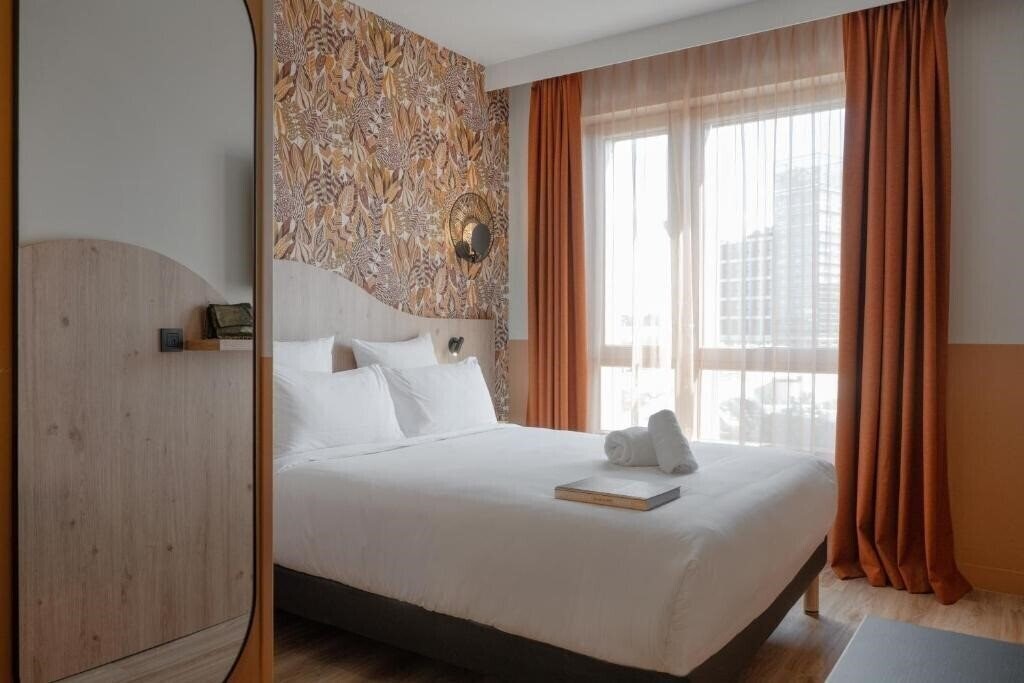 Фотография All Suites Hotel Paris Pleyel L’Ile Saint Denis 3*