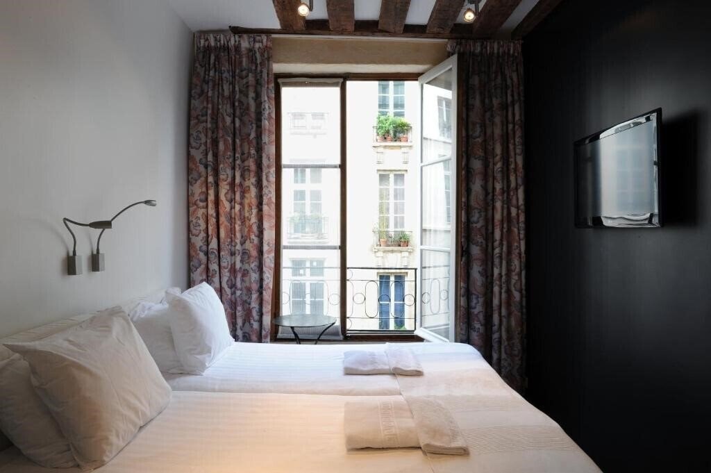 Фото Boutique Hotel De La Place Des Vosges 3*