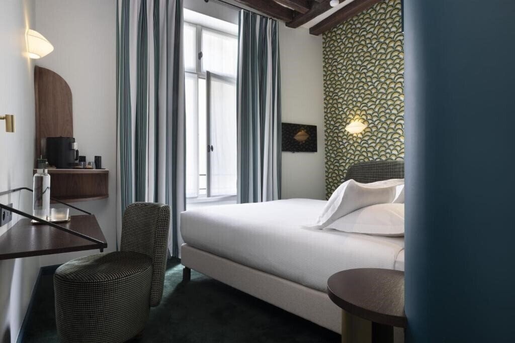 Фото Hotel L de Lutece 4*