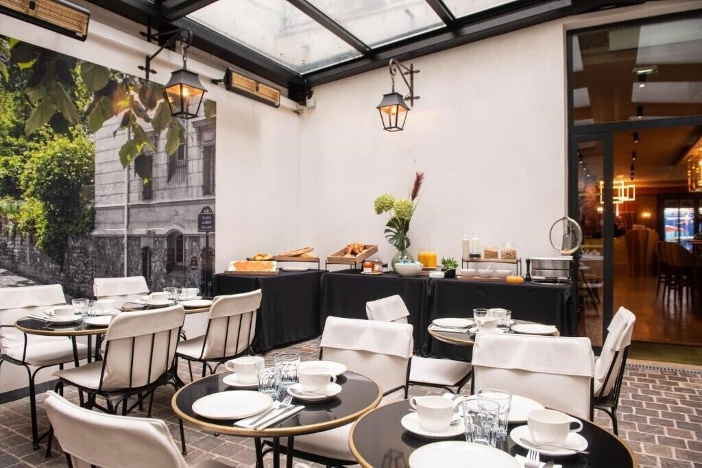 Фотографія Mom'Art Hotel 4*