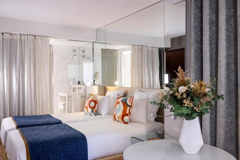 Фото Hotel 7 Eiffel by Malone 4*