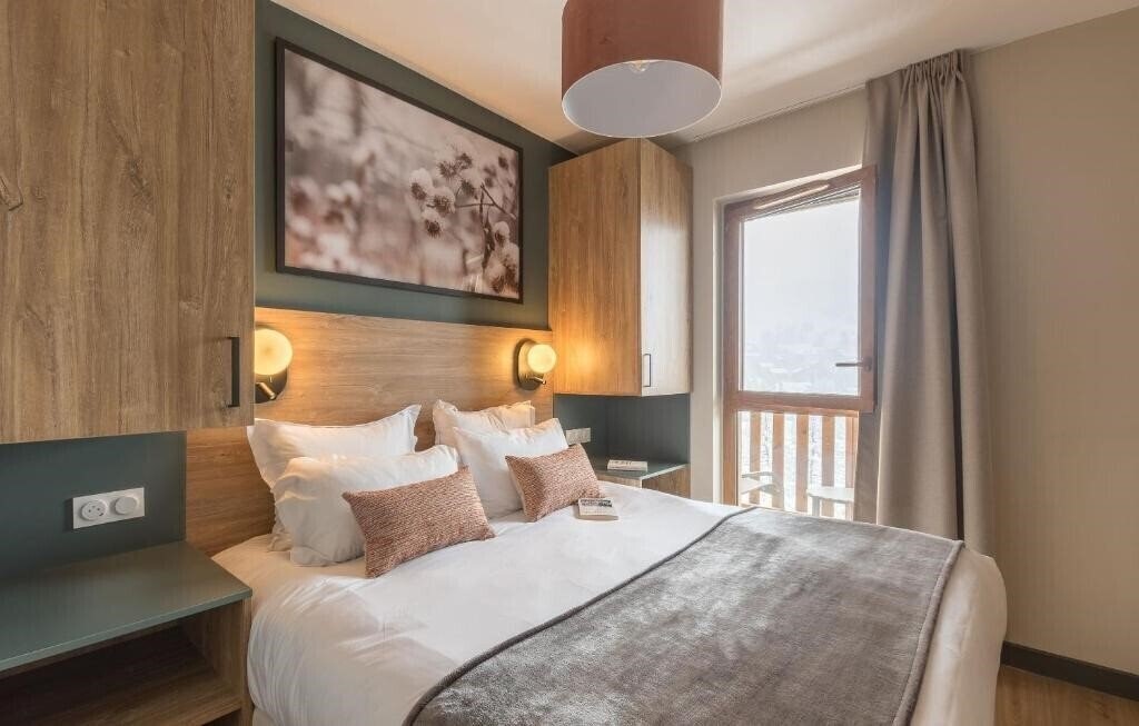 Фотографія Residence Odalys L'Ecrin de Vars 4*