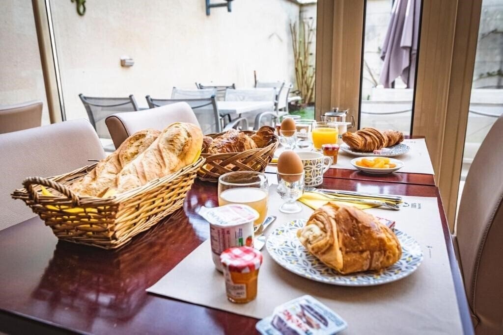 Фотографія Logis Hotel Au Tambour 3*