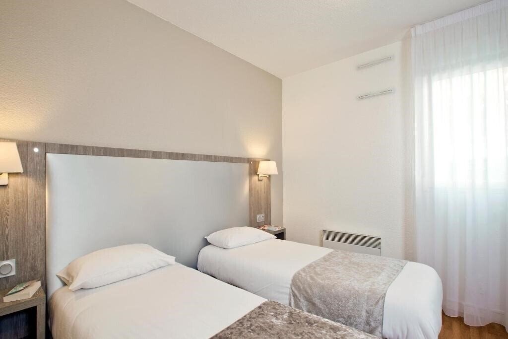 Изображение Sejours & Affaires Reims Clairmarais 2*
