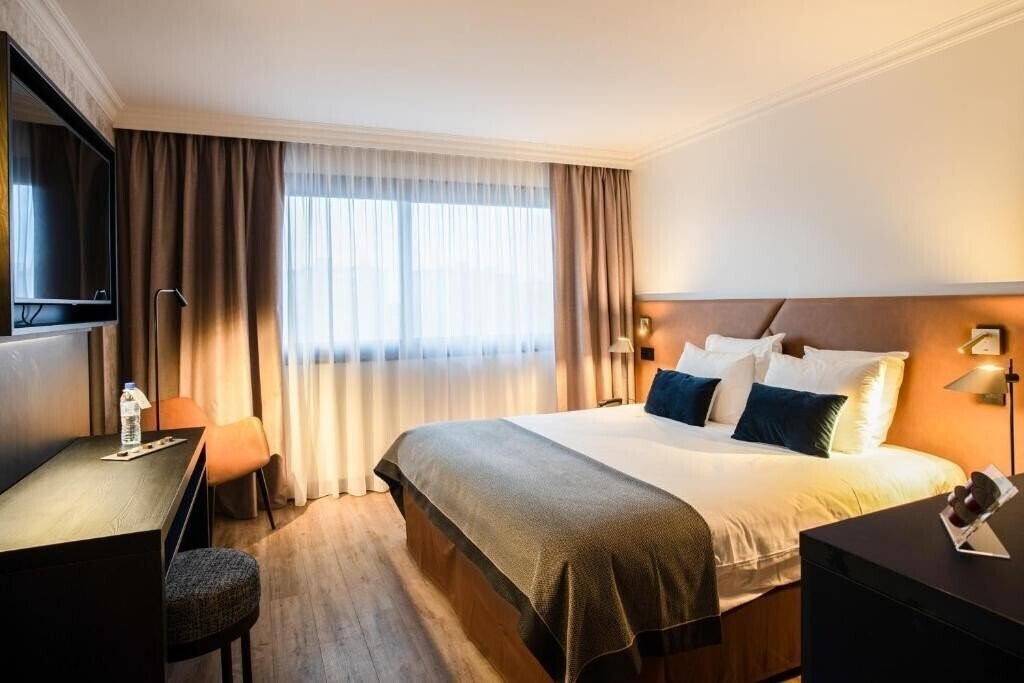 Фотографія Appart'City Collection Geneve Aeroport Ferney Voltaire 4*