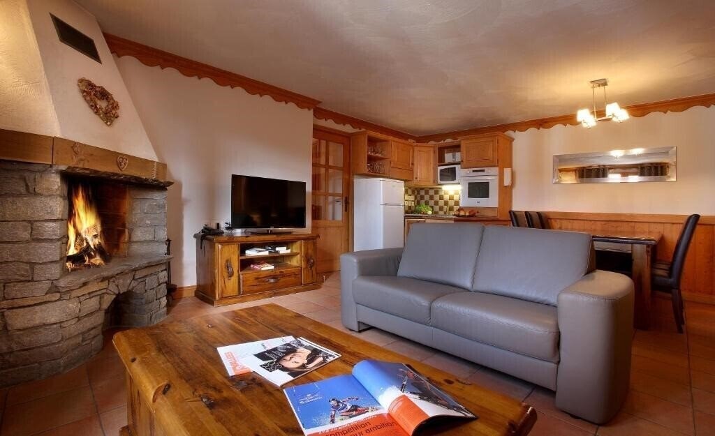 Фотографія Chalet Des Neiges Residence Plein Sud 4*