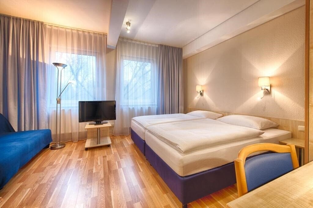 Фото Enjoy Hotel Berlin City Messe 3*