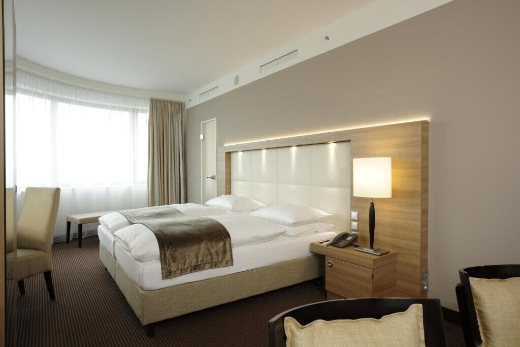 Фотография H4 Hotel Berlin Alexanderplatz 4*