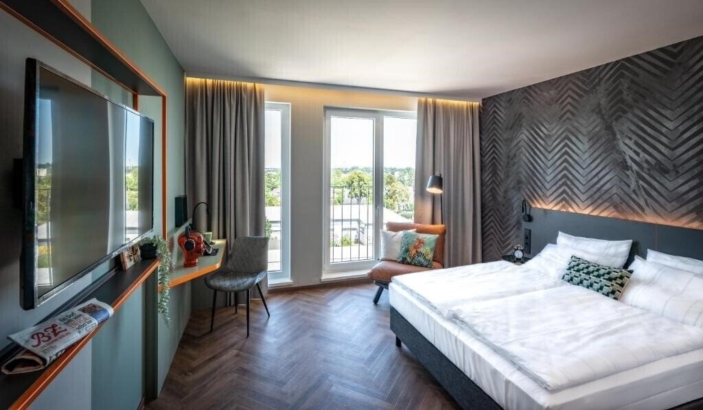 Отель Loginn Hotel Berlin Airport 3*