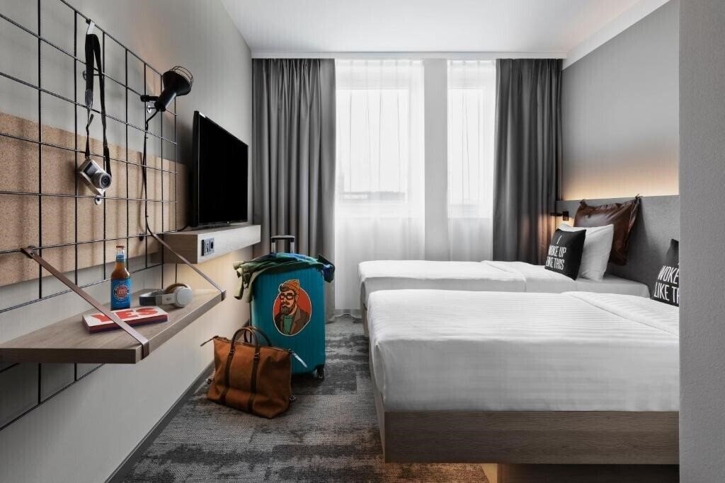 Фото Moxy Duesseldorf City 4*