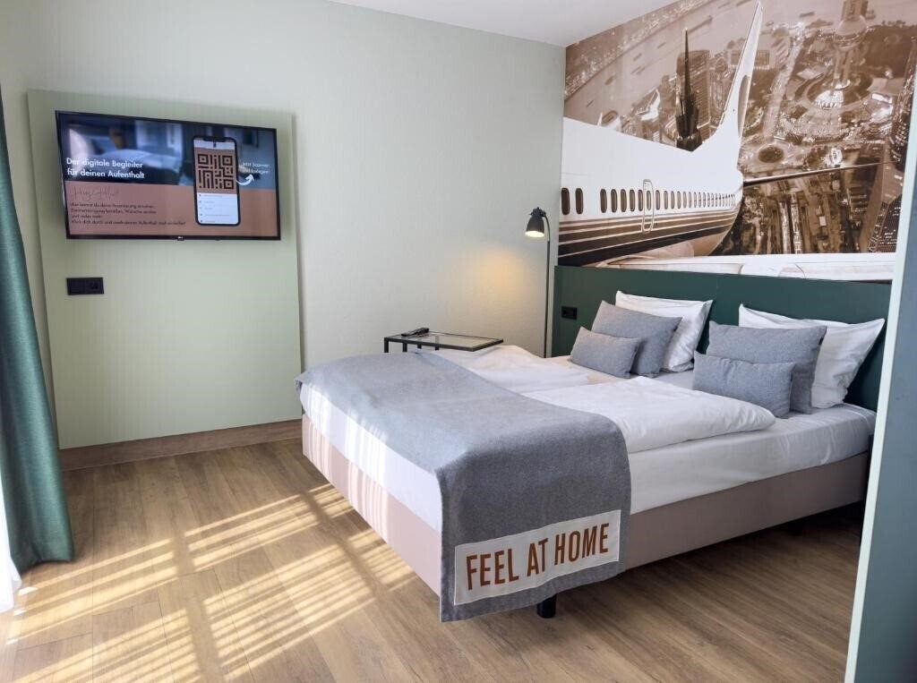 Отель Achat Comfort Airport-Frankfurt 1*