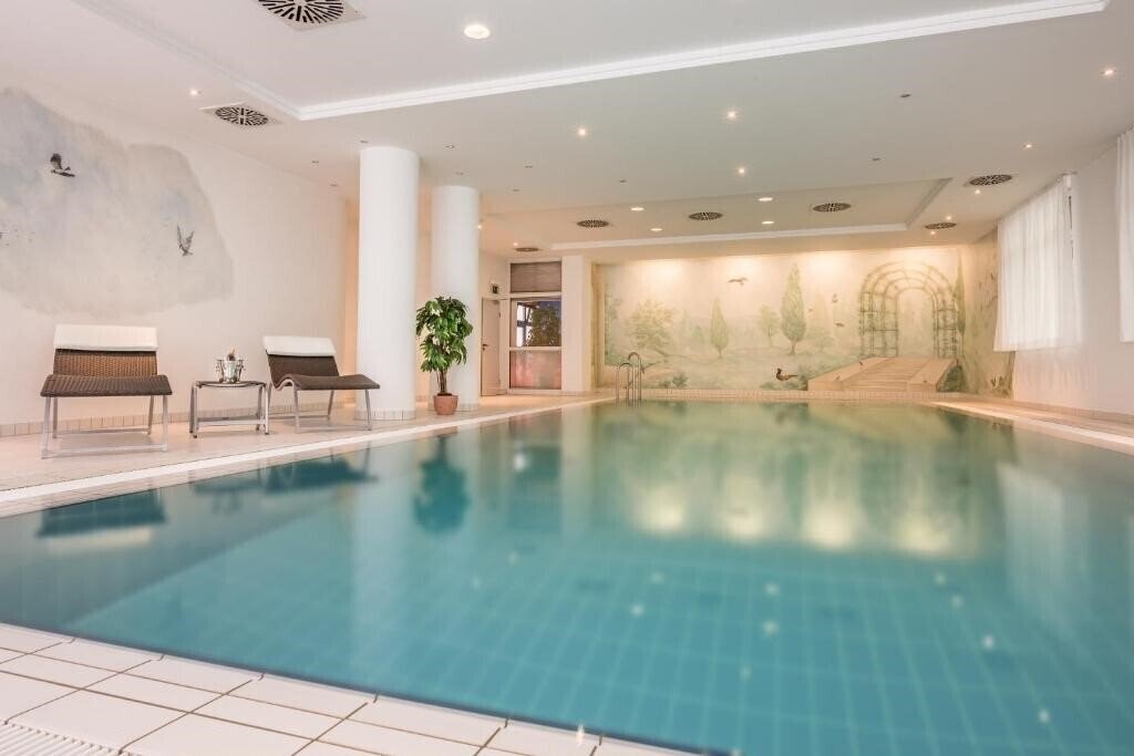 Фото Am Moosfeld 4*