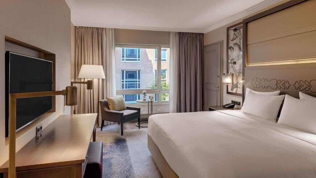 Фото Hilton Munich City 4*