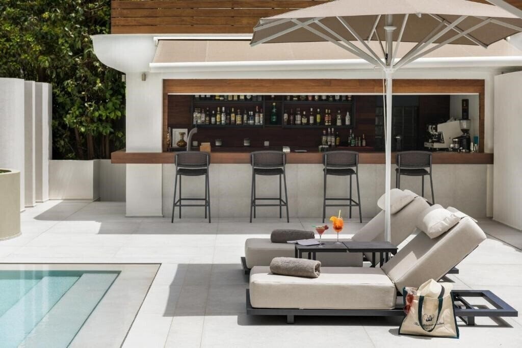 Фотографія Blazer Suites 4*